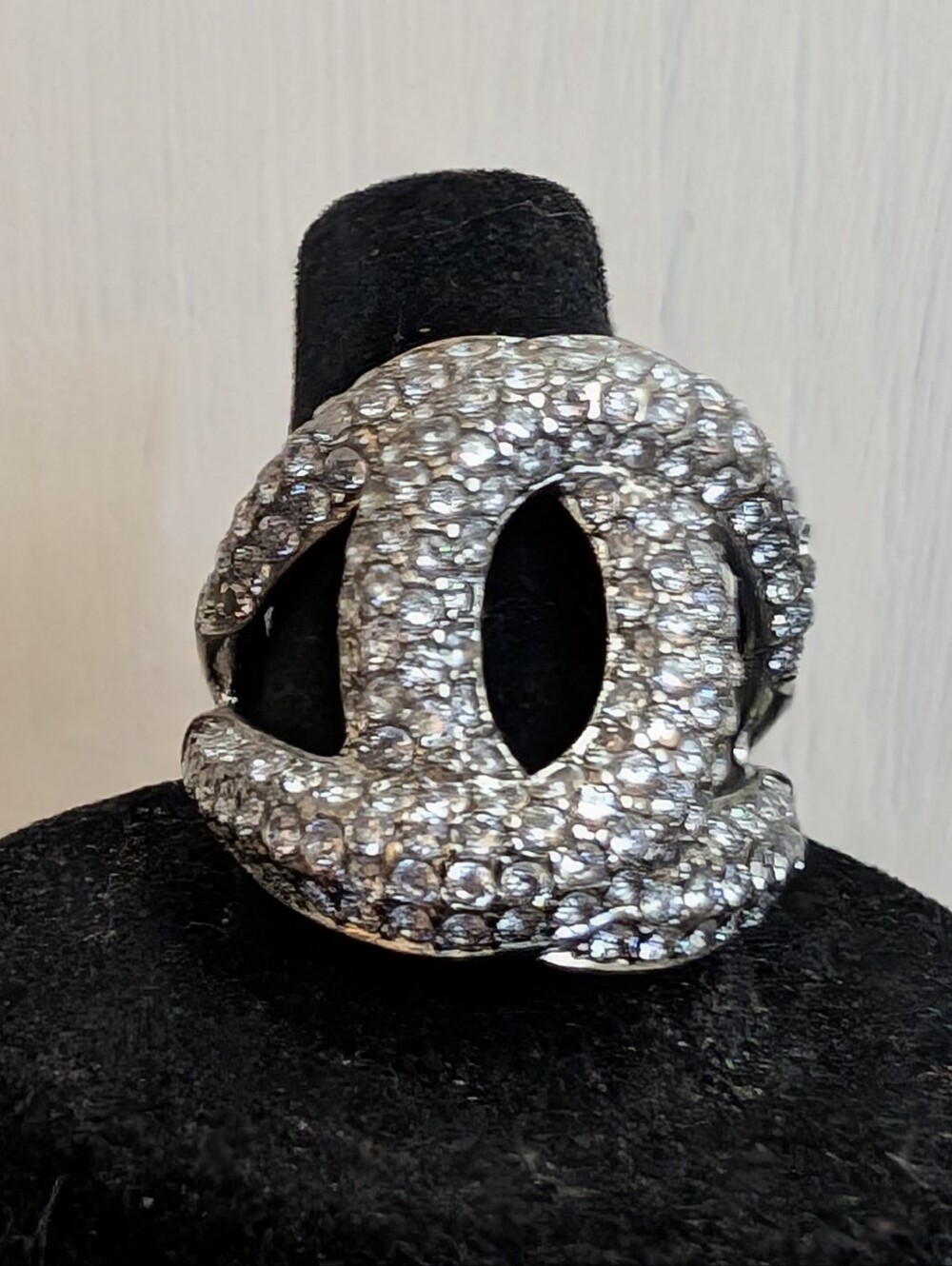 # 89. Crystal Pavé Interlocking Double-C Logo Ring - Silver Tone